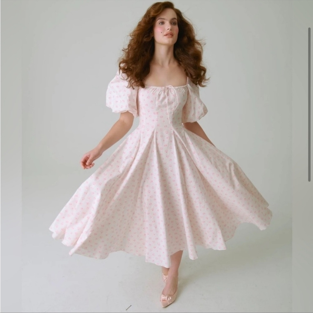 Selkie Pink Puff Sleeve Midi Dress with Subtle Floral Print